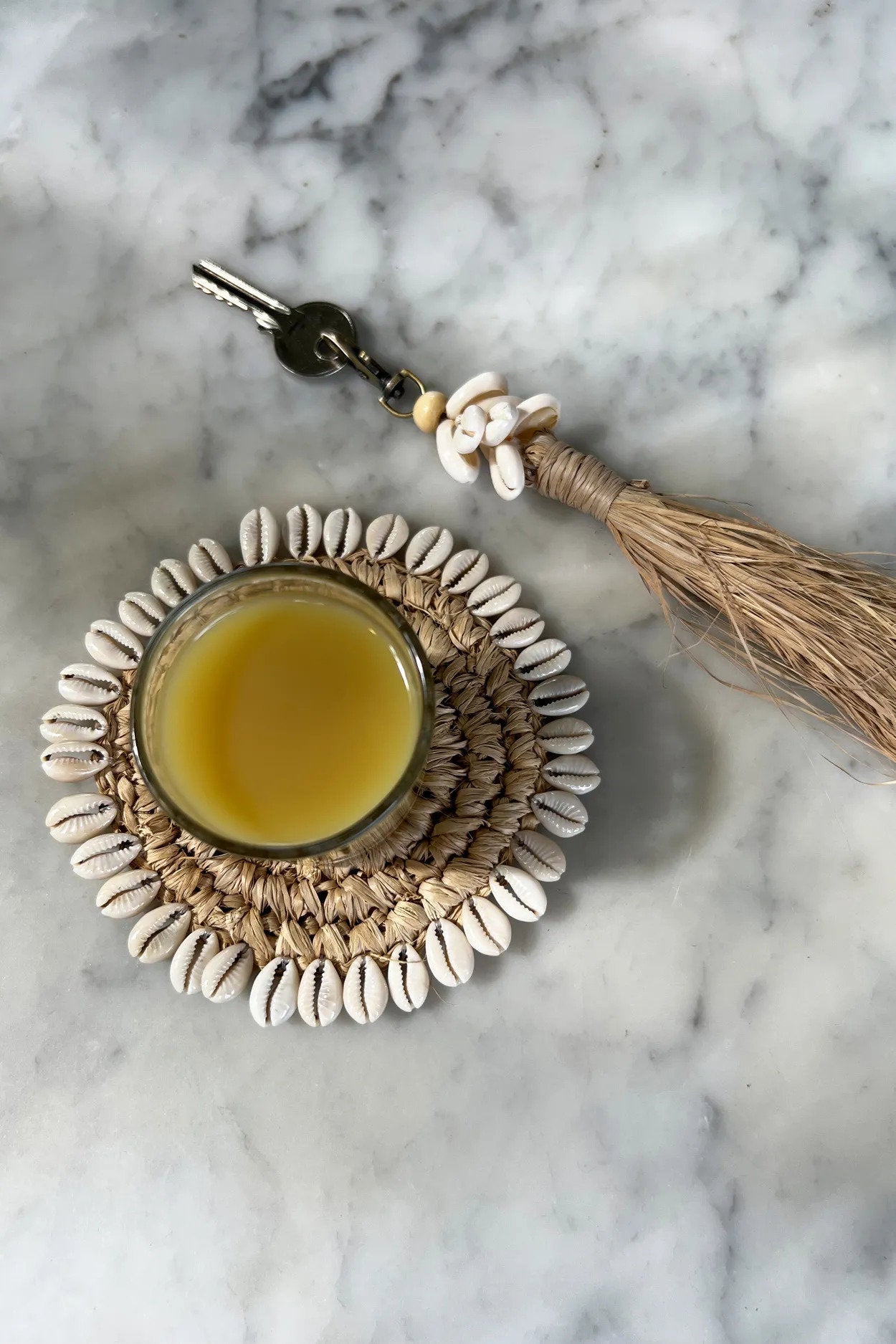 Der Raffia-Muschel-Untersetzer – Natürlich