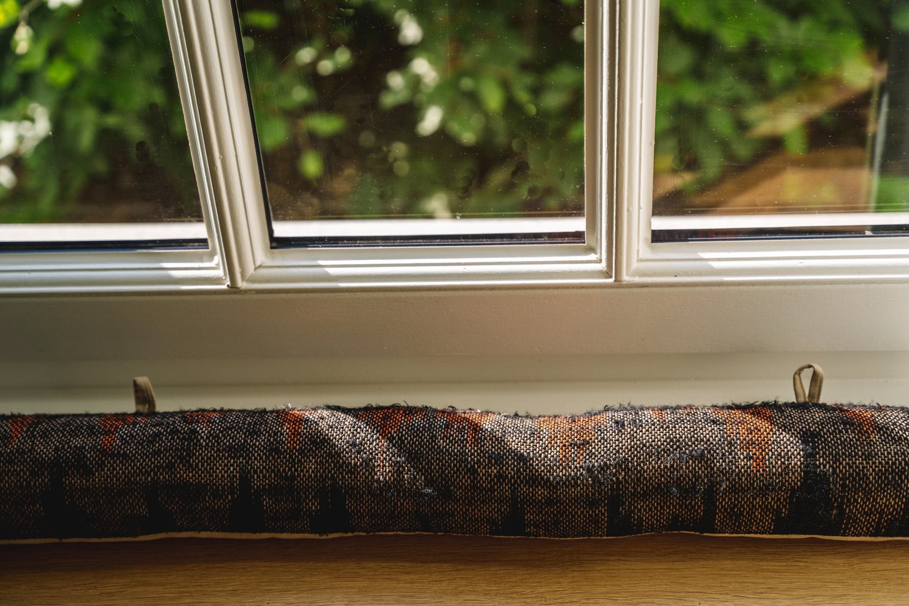 The Oh My Gee Doorstop - Black Orange
