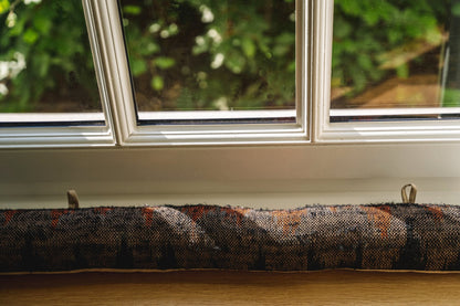 The Oh My Gee Doorstop - Black Orange